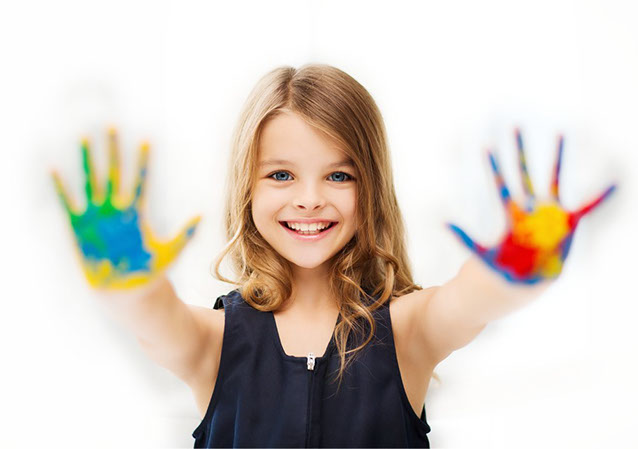 little girl with paint on hands